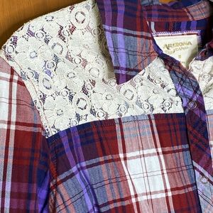 Fun plaid button shirt with floral lace detail.